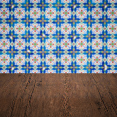 Image showing Wood table top and blur vintage ceramic tile pattern wall