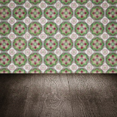 Image showing Wood table top and blur vintage ceramic tile pattern wall