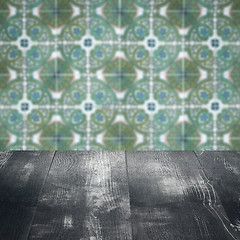 Image showing Wood table top and blur vintage ceramic tile pattern wall