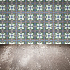 Image showing Wood table top and blur vintage ceramic tile pattern wall