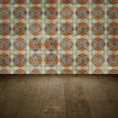 Image showing Wood table top and blur vintage ceramic tile pattern wall