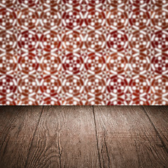 Image showing Wood table top and blur vintage ceramic tile pattern wall