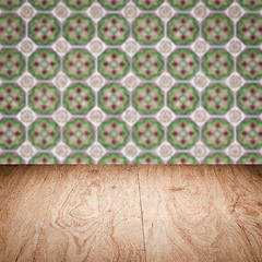 Image showing Wood table top and blur vintage ceramic tile pattern wall