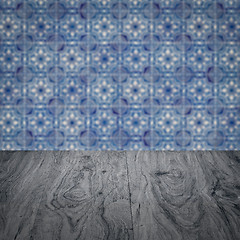 Image showing Wood table top and blur vintage ceramic tile pattern wall