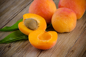 Image showing Apricots with leaves