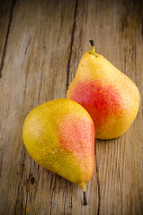 Image showing Pears in a old wooden table