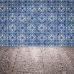 Image showing Wood table top and blur vintage ceramic tile pattern wall