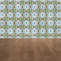 Image showing Wood table top and blur vintage ceramic tile pattern wall