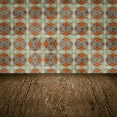 Image showing Wood table top and blur vintage ceramic tile pattern wall