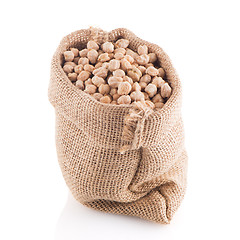 Image showing Uncooked chickpeas on burlap bag