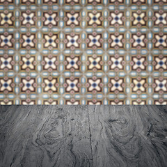 Image showing Wood table top and blur vintage ceramic tile pattern wall