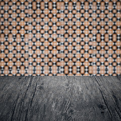 Image showing Wood table top and blur vintage ceramic tile pattern wall