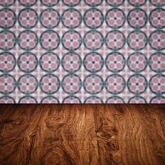 Image showing Wood table top and blur vintage ceramic tile pattern wall