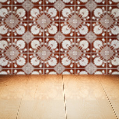 Image showing Wood table top and blur vintage ceramic tile pattern wall