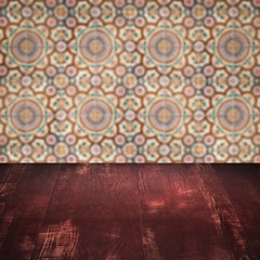 Image showing Wood table top and blur vintage ceramic tile pattern wall