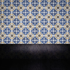 Image showing Wood table top and blur vintage ceramic tile pattern wall