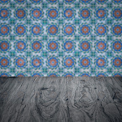 Image showing Wood table top and blur vintage ceramic tile pattern wall