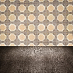 Image showing Wood table top and blur vintage ceramic tile pattern wall