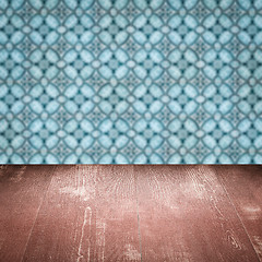 Image showing Wood table top and blur vintage ceramic tile pattern wall