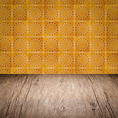 Image showing Wood table top and blur vintage ceramic tile pattern wall