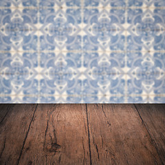 Image showing Wood table top and blur vintage ceramic tile pattern wall