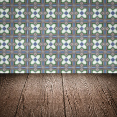 Image showing Wood table top and blur vintage ceramic tile pattern wall