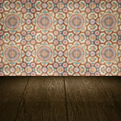 Image showing Wood table top and blur vintage ceramic tile pattern wall