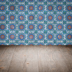 Image showing Wood table top and blur vintage ceramic tile pattern wall