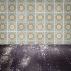 Image showing Wood table top and blur vintage ceramic tile pattern wall