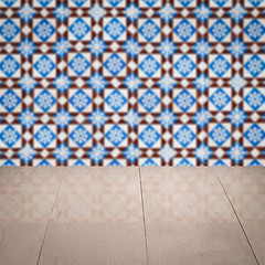 Image showing Wood table top and blur vintage ceramic tile pattern wall