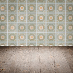 Image showing Wood table top and blur vintage ceramic tile pattern wall