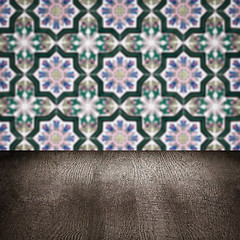 Image showing Wood table top and blur vintage ceramic tile pattern wall