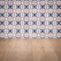 Image showing Wood table top and blur vintage ceramic tile pattern wall