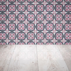 Image showing Wood table top and blur vintage ceramic tile pattern wall