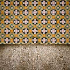 Image showing Wood table top and blur vintage ceramic tile pattern wall