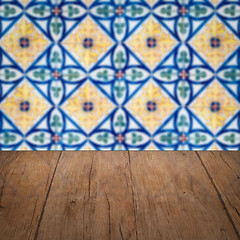 Image showing Wood table top and blur vintage ceramic tile pattern wall