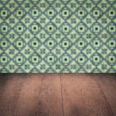 Image showing Wood table top and blur vintage ceramic tile pattern wall