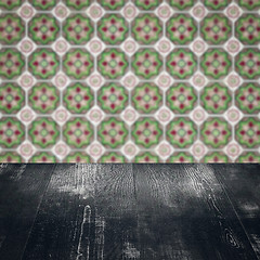 Image showing Wood table top and blur vintage ceramic tile pattern wall