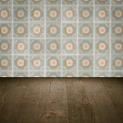 Image showing Wood table top and blur vintage ceramic tile pattern wall