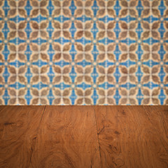 Image showing Wood table top and blur vintage ceramic tile pattern wall