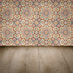 Image showing Wood table top and blur vintage ceramic tile pattern wall