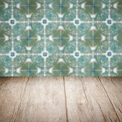 Image showing Wood table top and blur vintage ceramic tile pattern wall