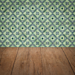 Image showing Wood table top and blur vintage ceramic tile pattern wall