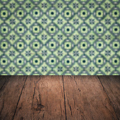 Image showing Wood table top and blur vintage ceramic tile pattern wall