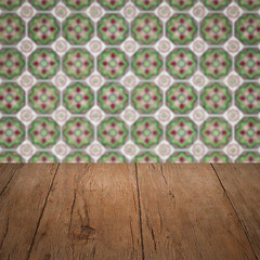 Image showing Wood table top and blur vintage ceramic tile pattern wall