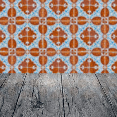 Image showing Wood table top and blur vintage ceramic tile pattern wall