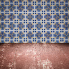 Image showing Wood table top and blur vintage ceramic tile pattern wall