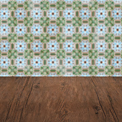 Image showing Wood table top and blur vintage ceramic tile pattern wall