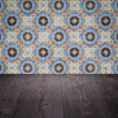 Image showing Wood table top and blur vintage ceramic tile pattern wall