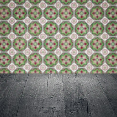 Image showing Wood table top and blur vintage ceramic tile pattern wall